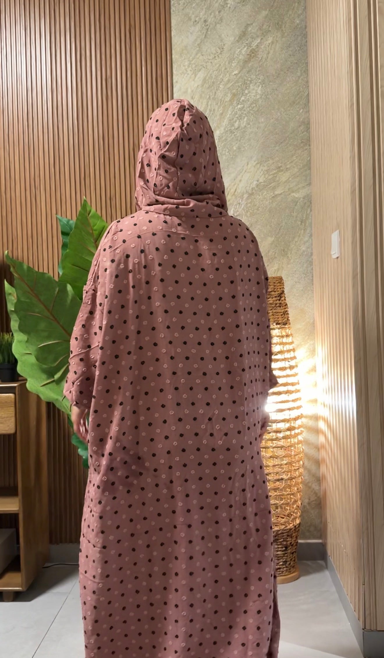Pink burqa with black dots