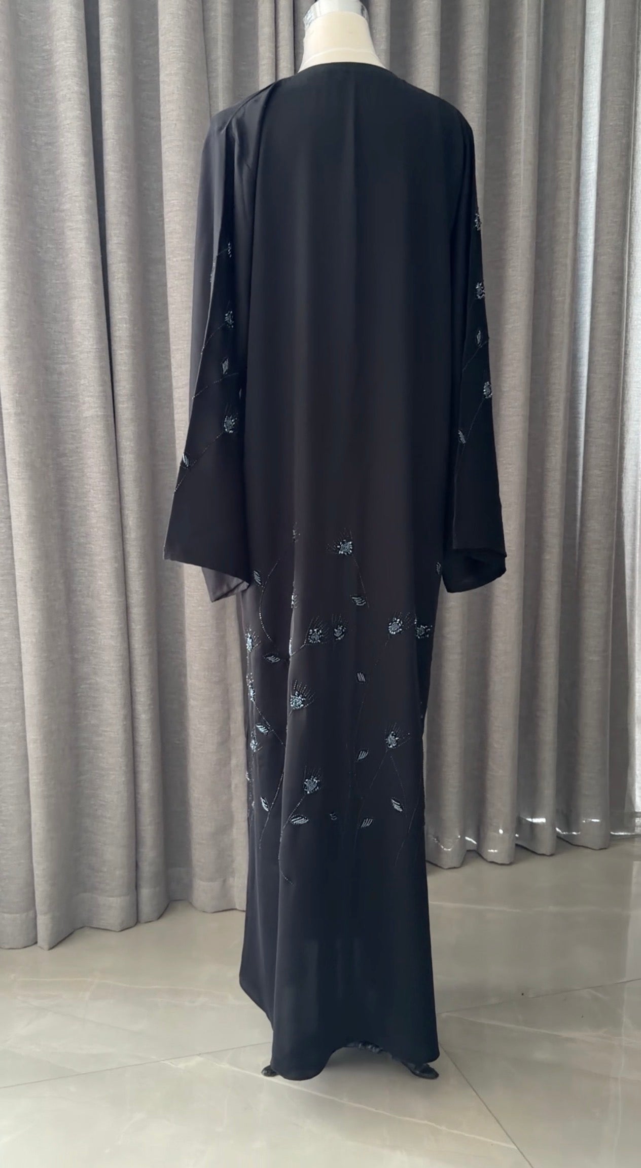 Black abayah with navy beadwork