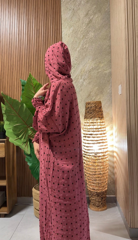 Coral burqa with black dots