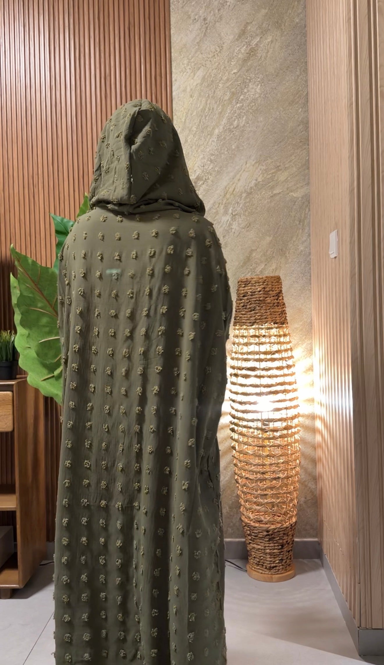 Army green burqa with big dots.