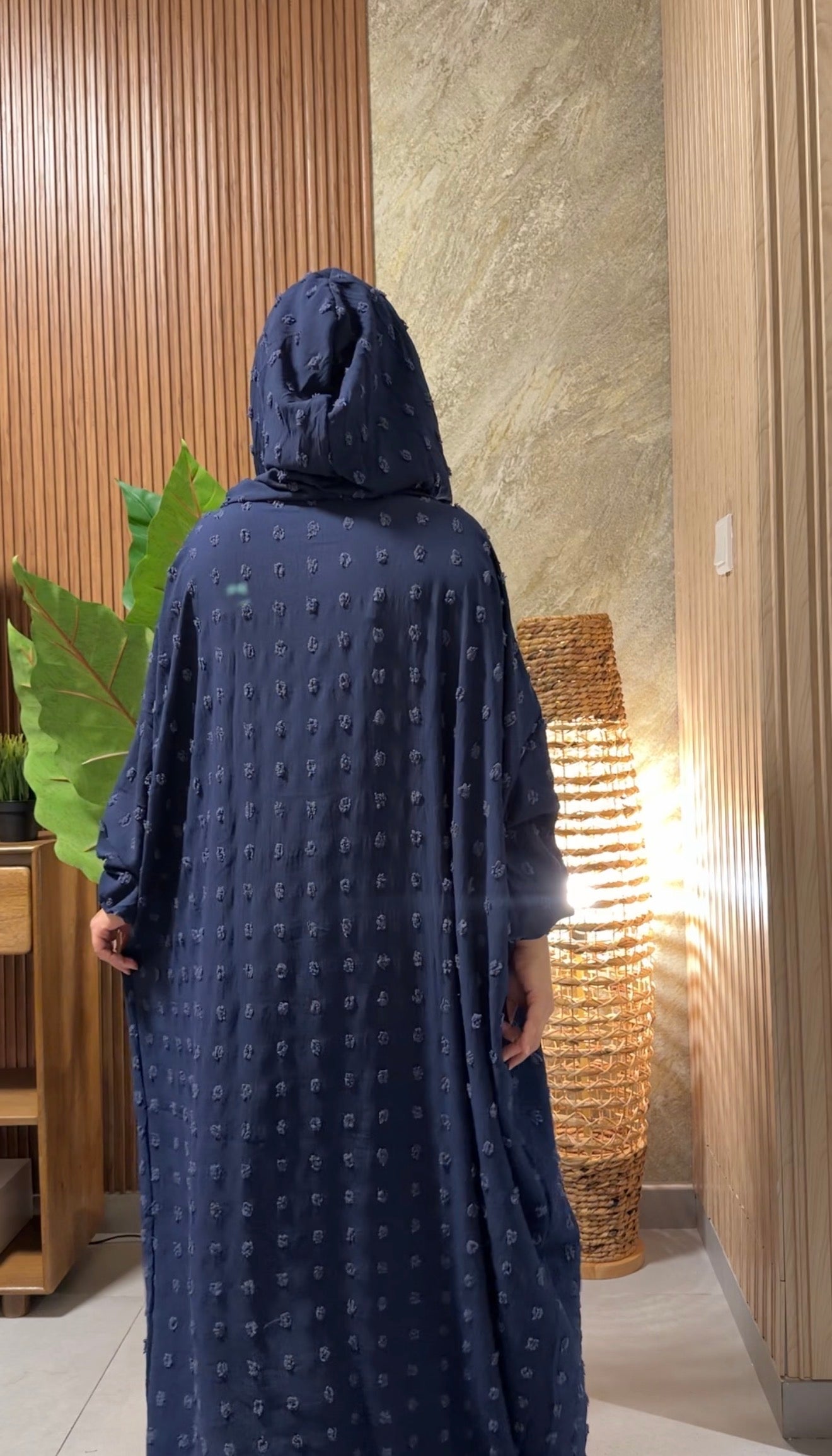 Navy burqa with big dots.