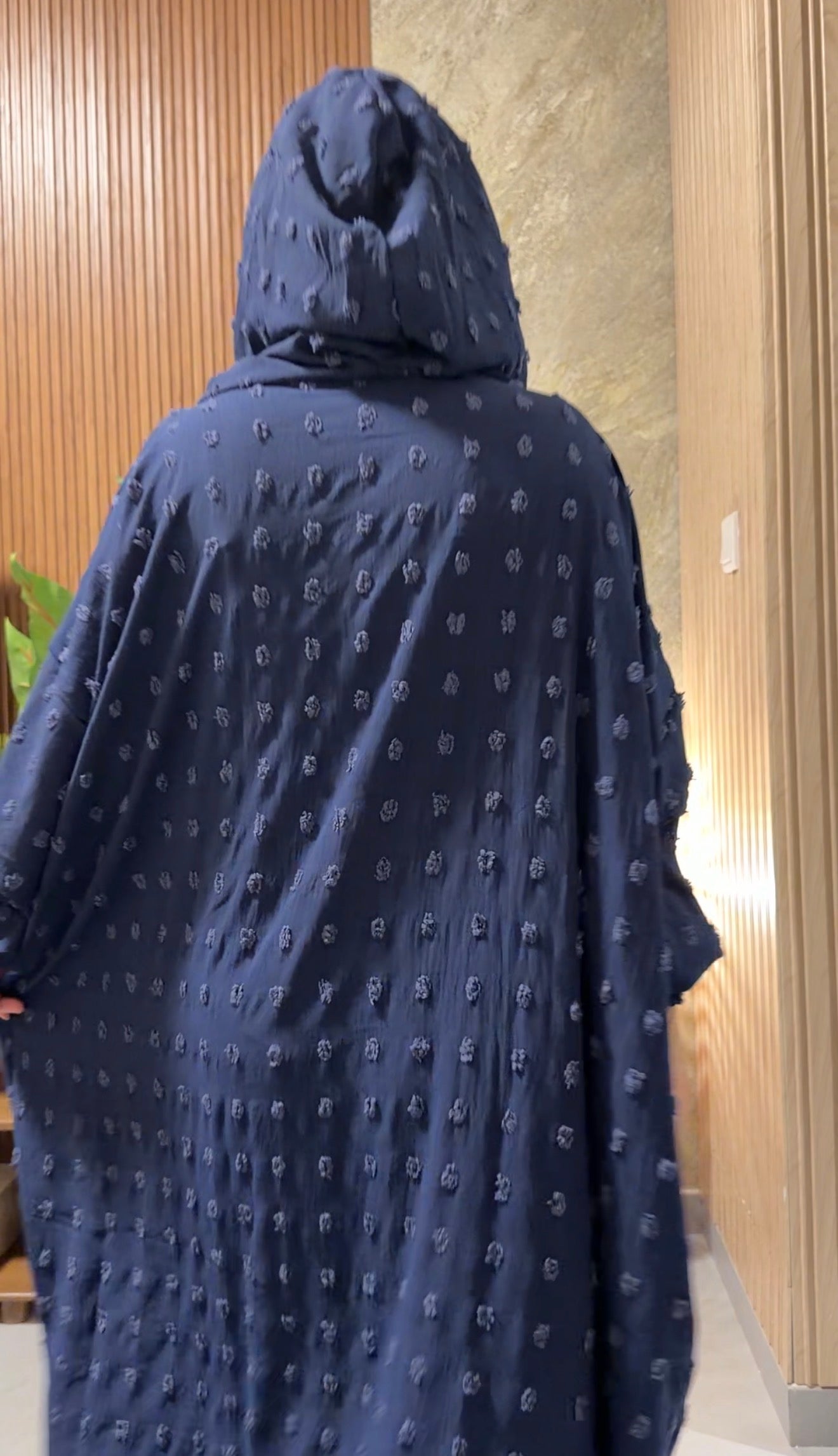 Navy burqa with big dots.