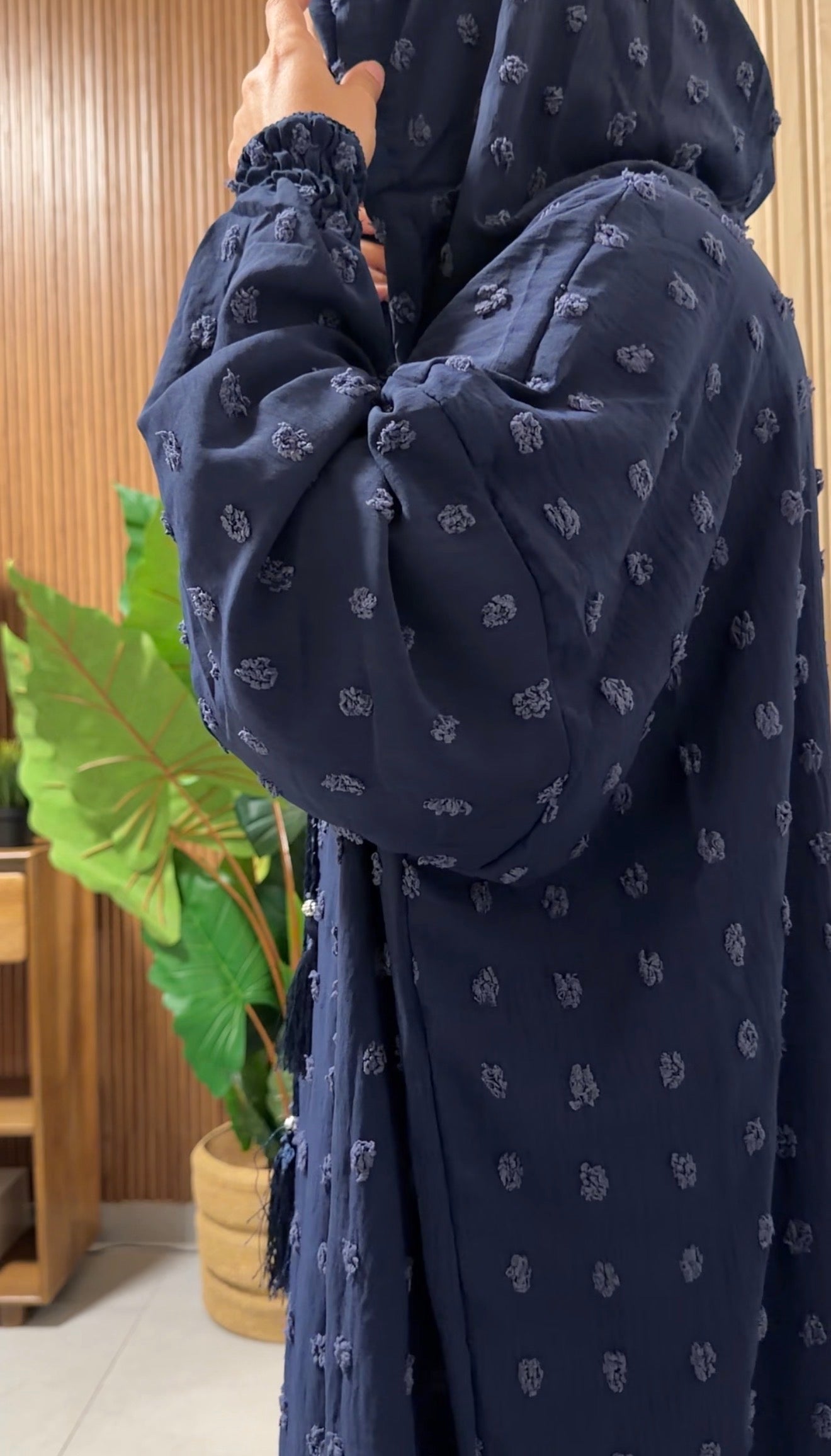 Navy burqa with big dots.