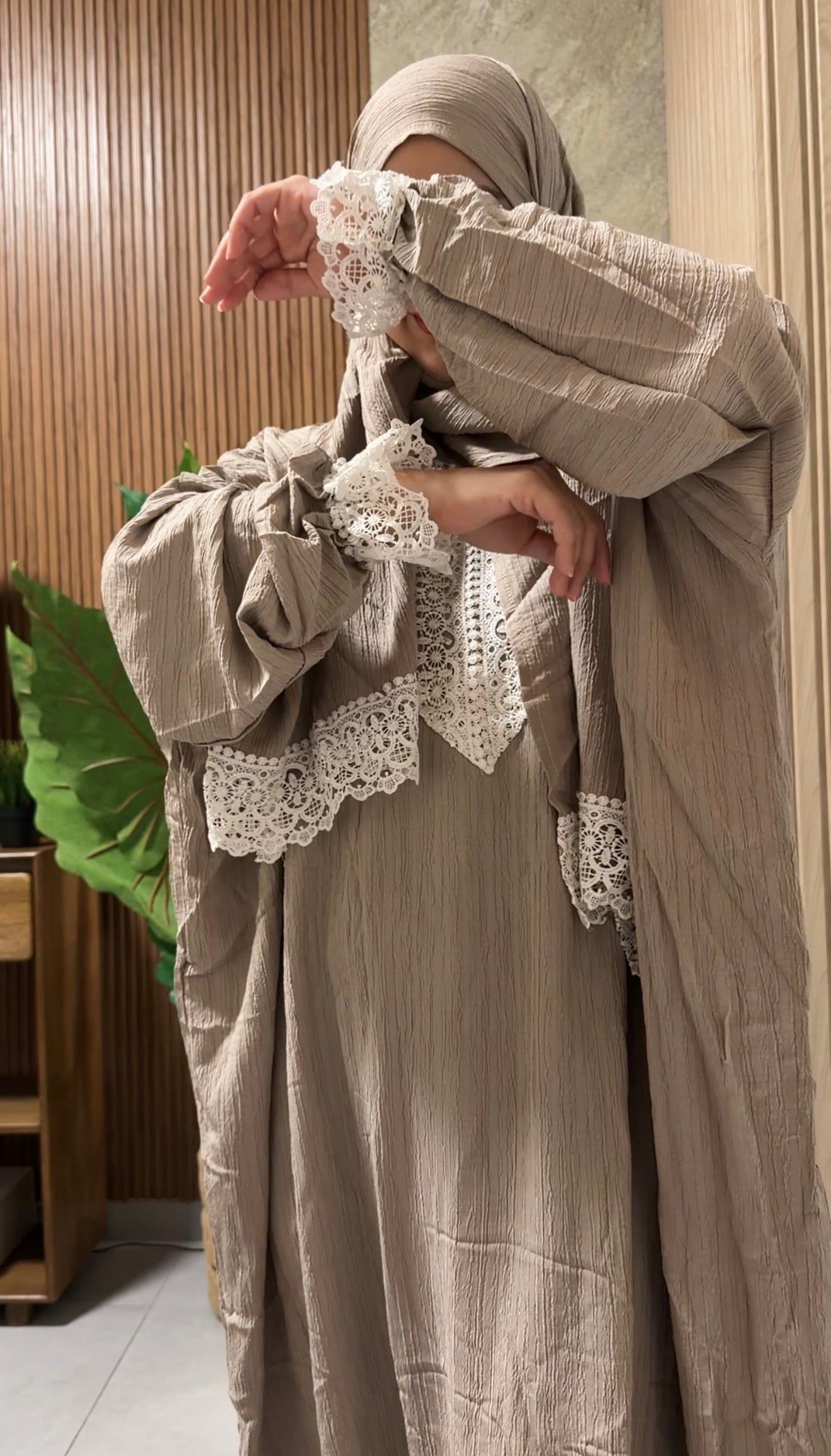 Grayish beige burqa with white lace