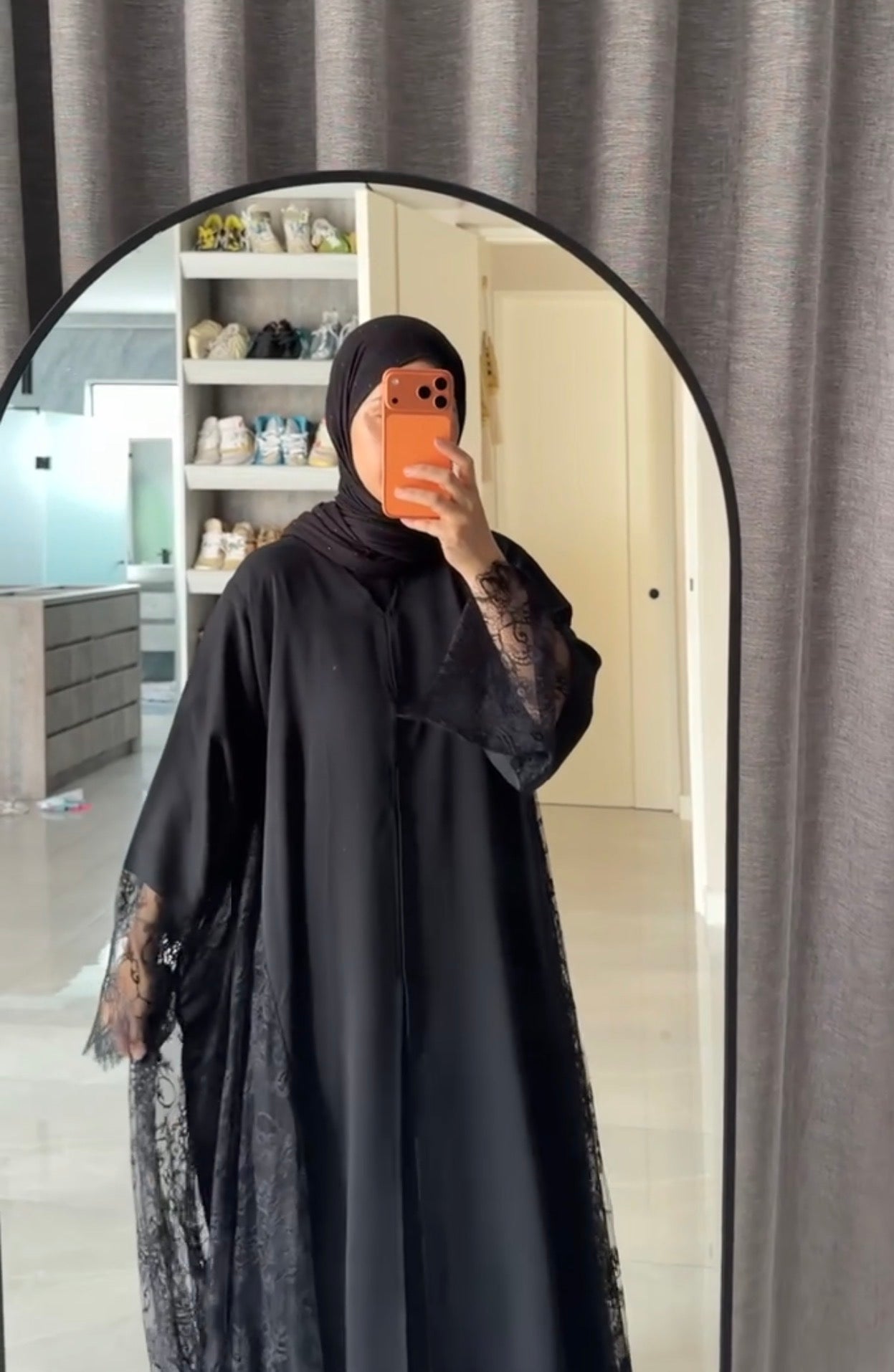 Black abayah with half net on sleeve at the bottom
