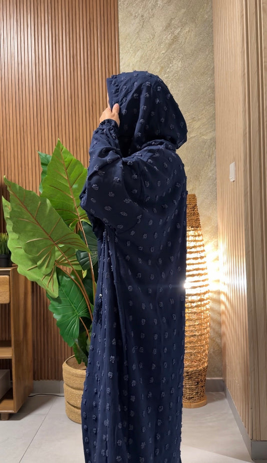Navy burqa with big dots.