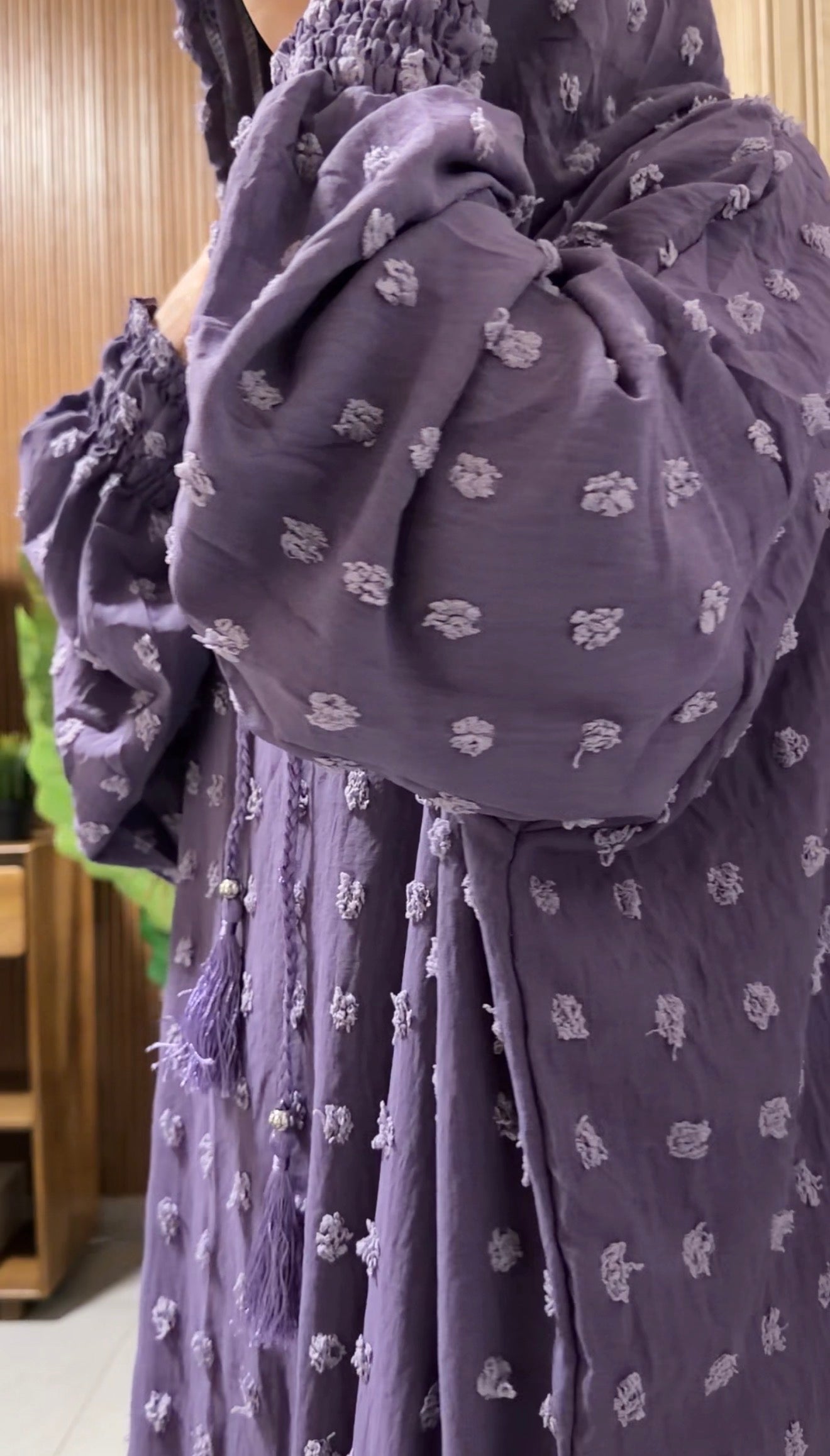 Purple burqa with big dots