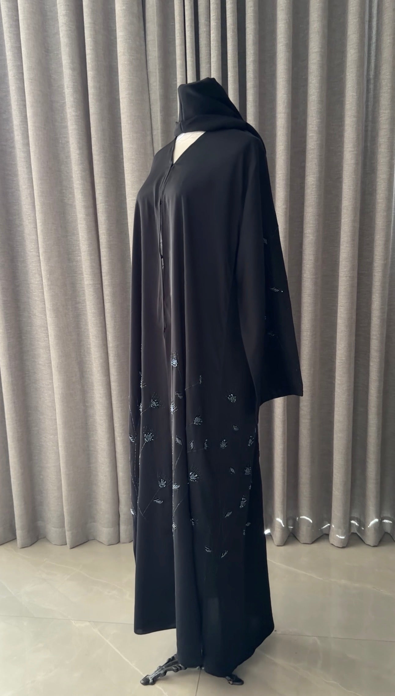 Black abayah with navy beadwork