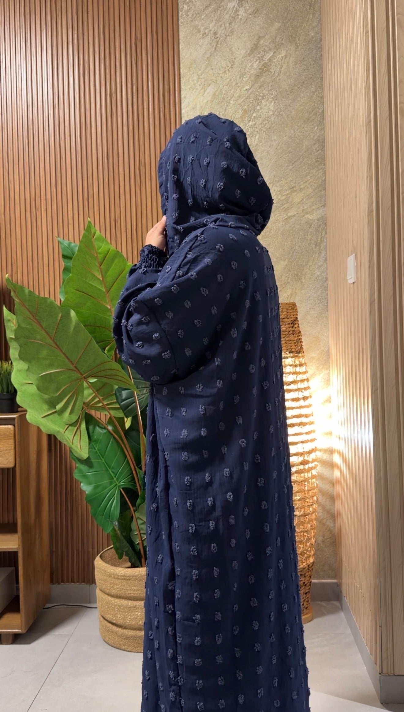 Navy burqa with big dots.