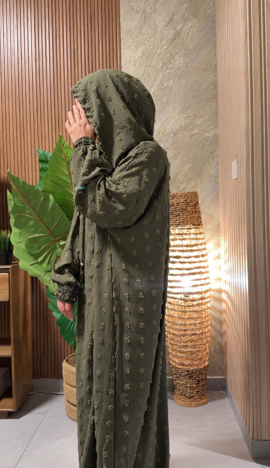 Army green burqa with big dots.