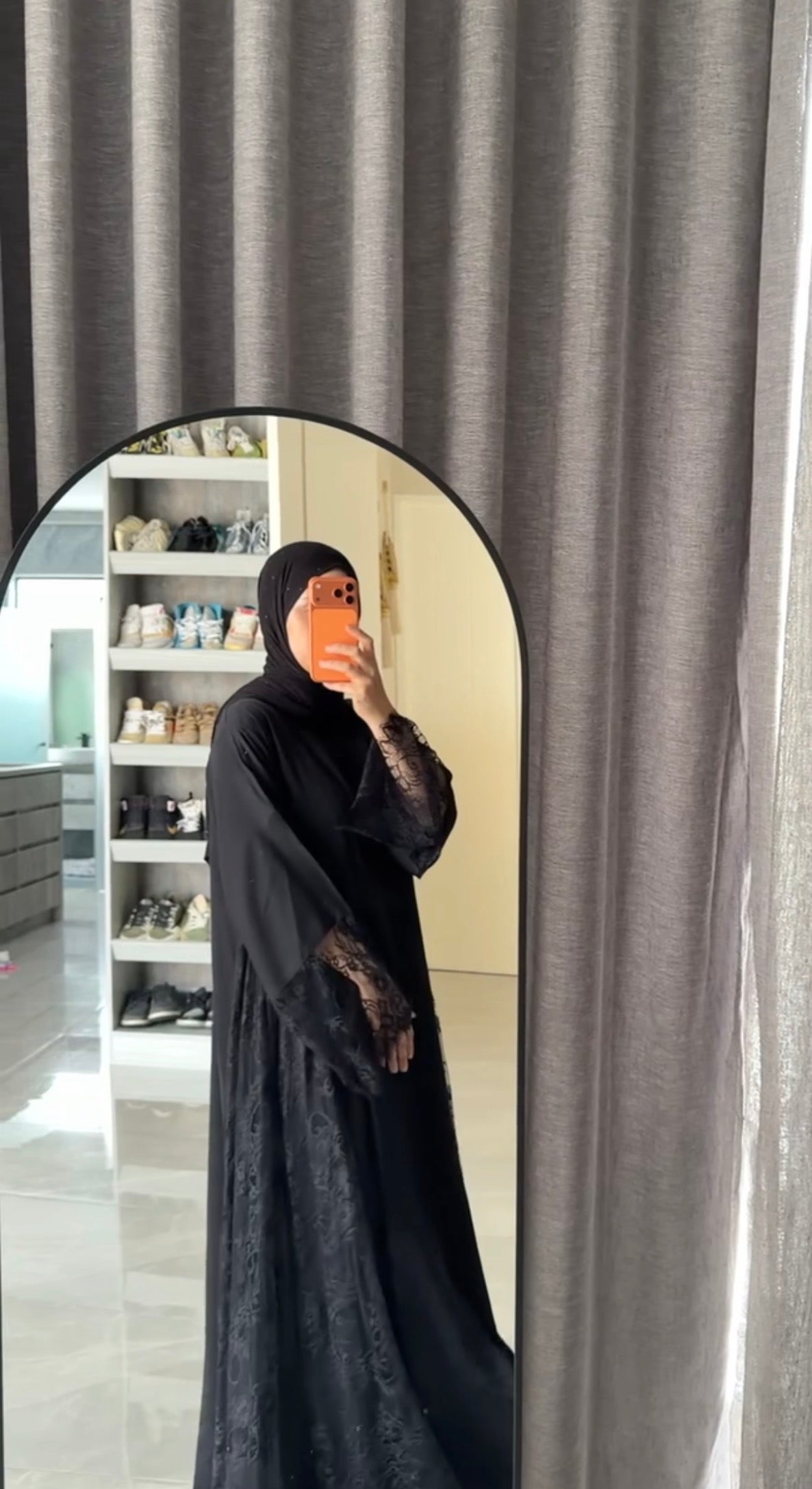 Black abayah with half net on sleeve at the bottom