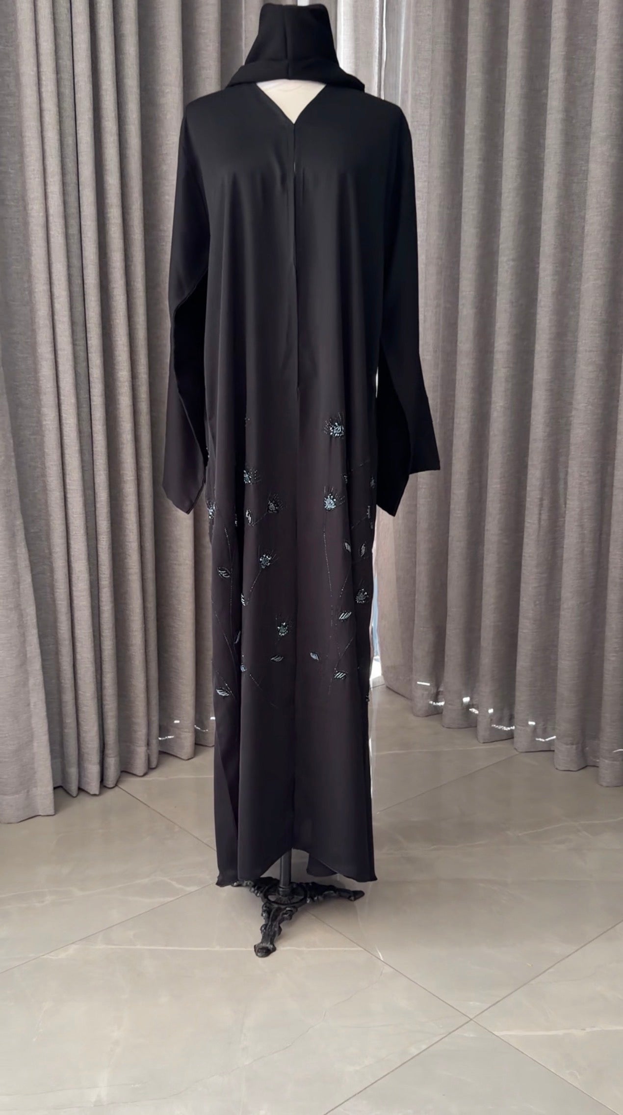 Black abayah with navy beadwork