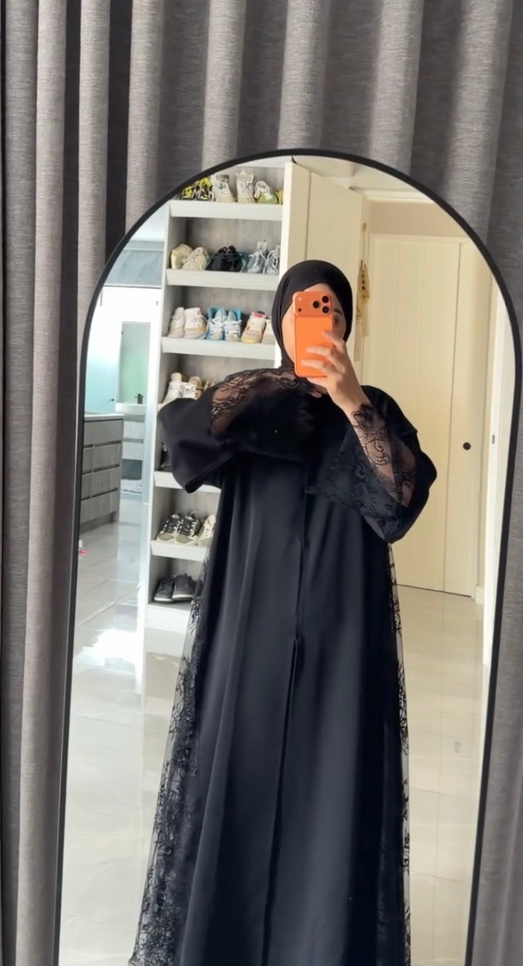 Black abayah with half net on sleeve at the bottom