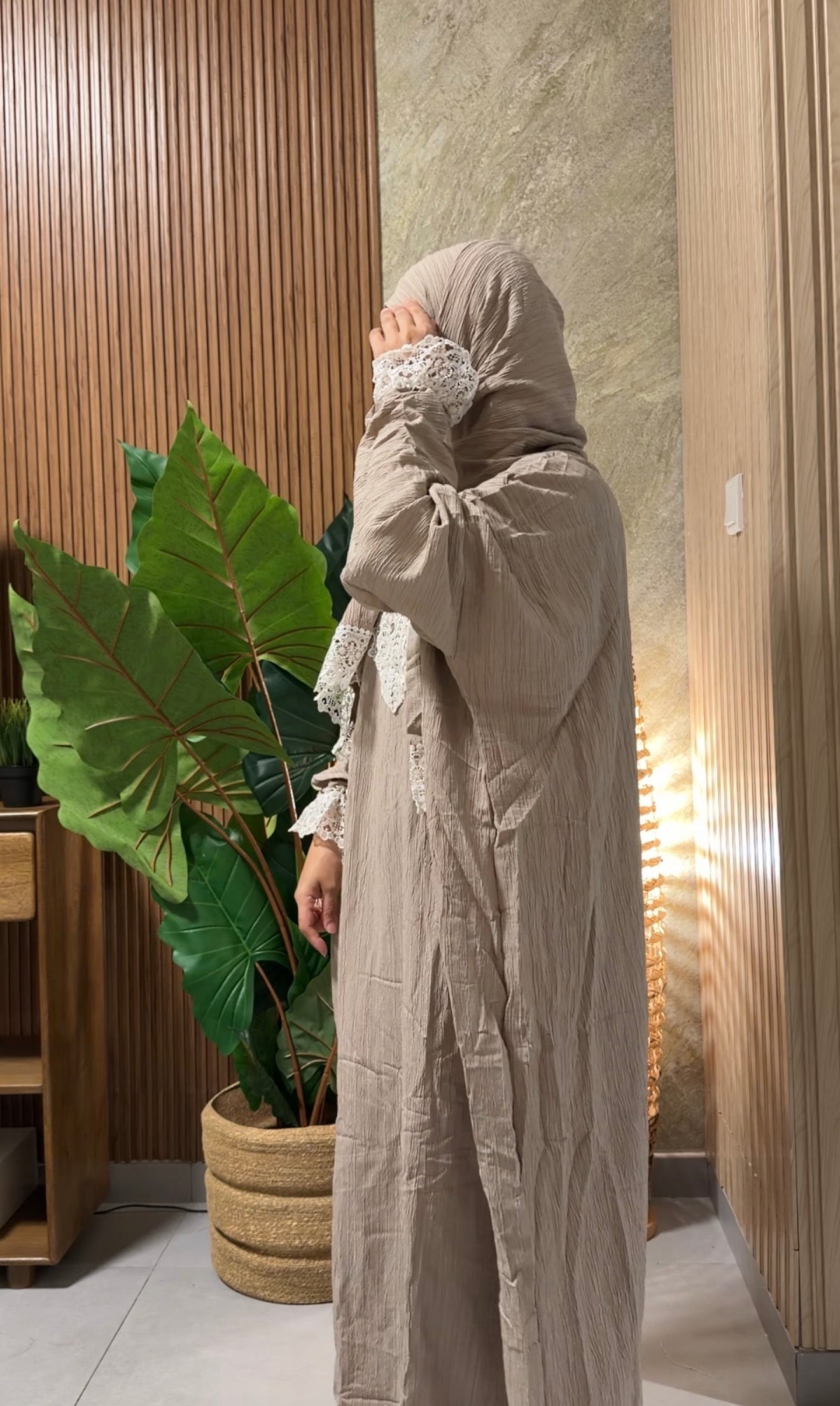Grayish beige burqa with white lace