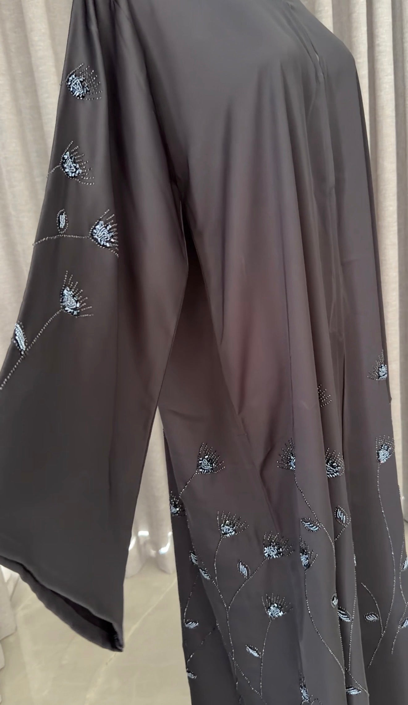 Black abayah with navy beadwork