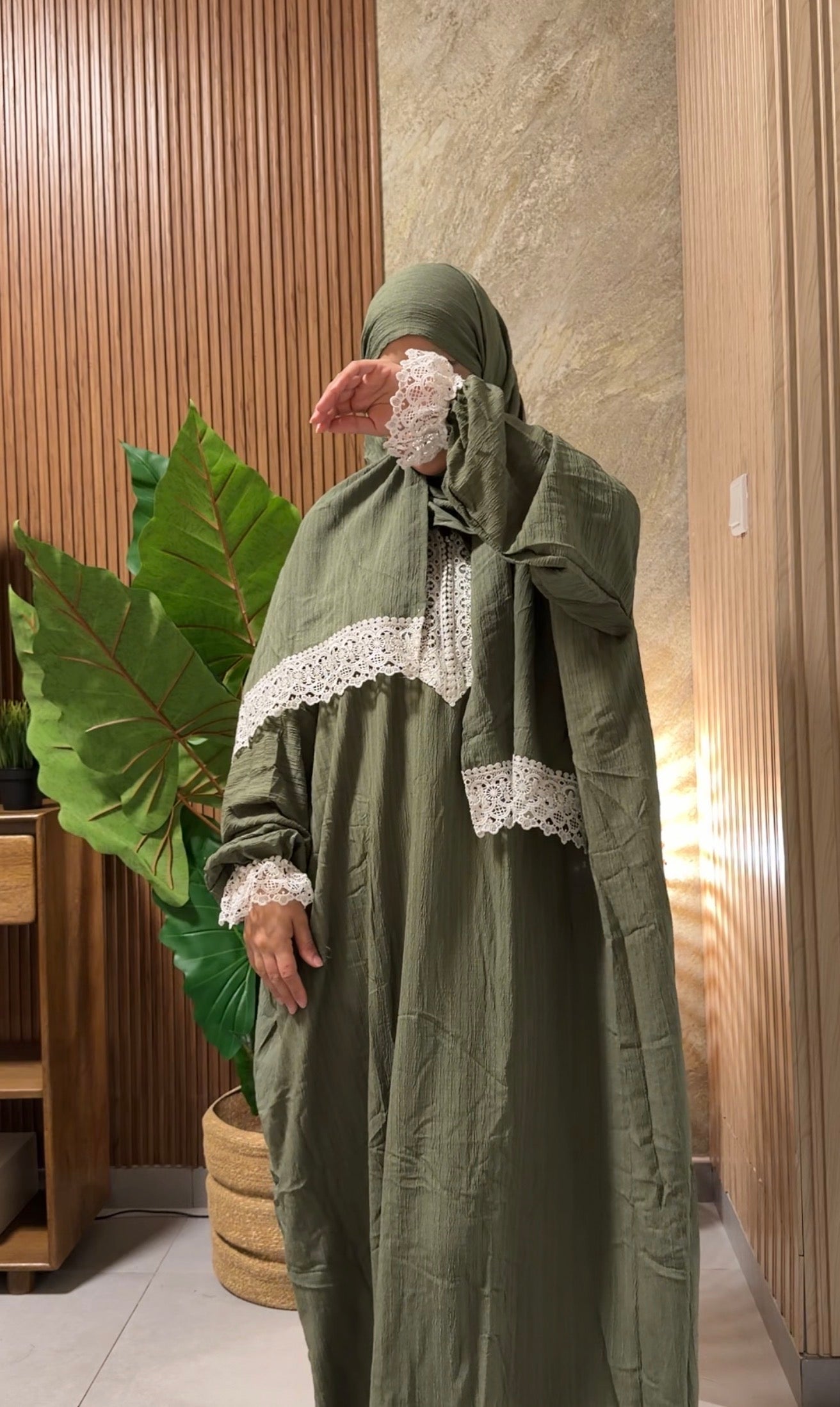 Green burqa with white lace
