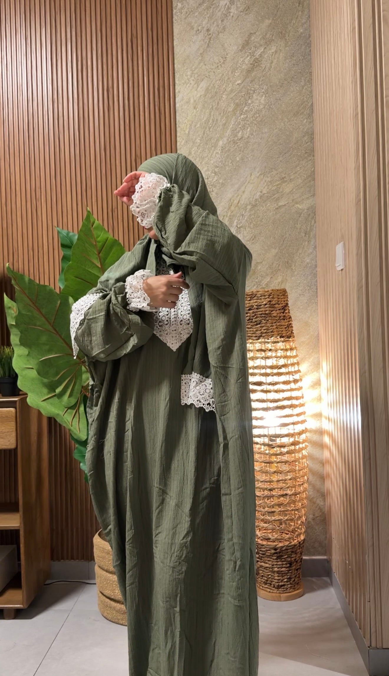 Green burqa with white lace