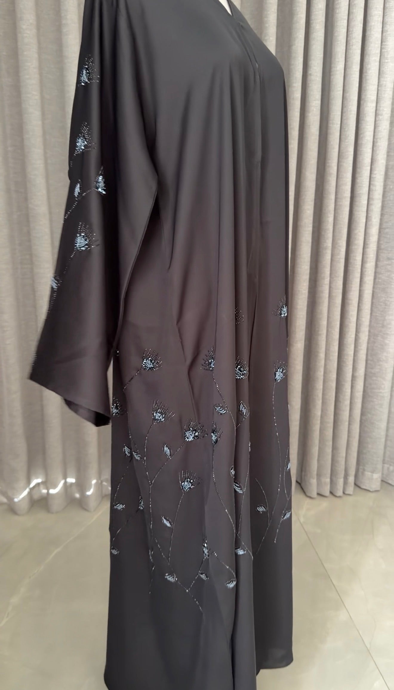 Black abayah with navy beadwork