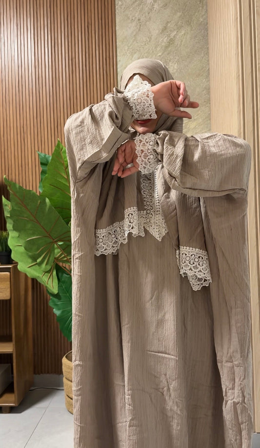Grayish beige burqa with white lace