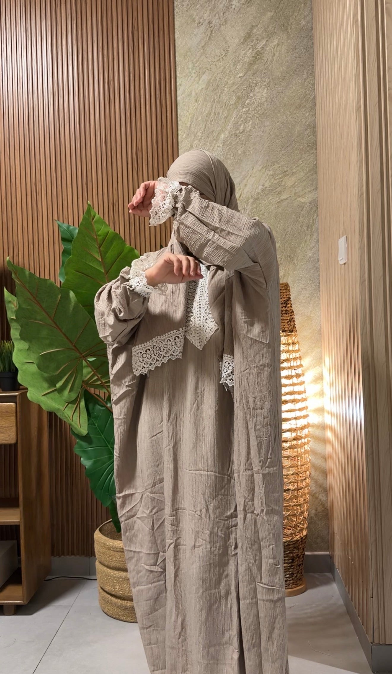 Grayish beige burqa with white lace