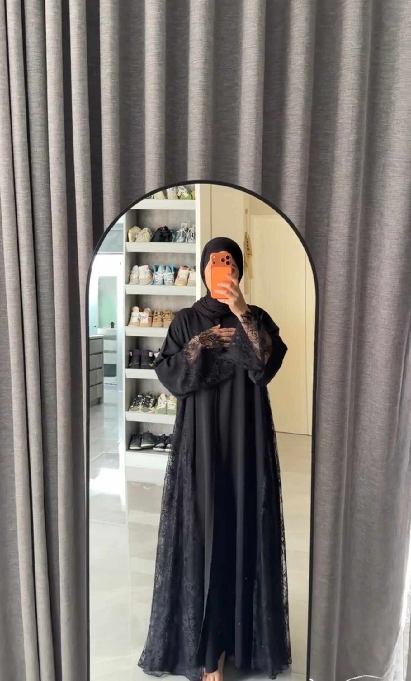 Black abayah with half net on sleeve at the bottom